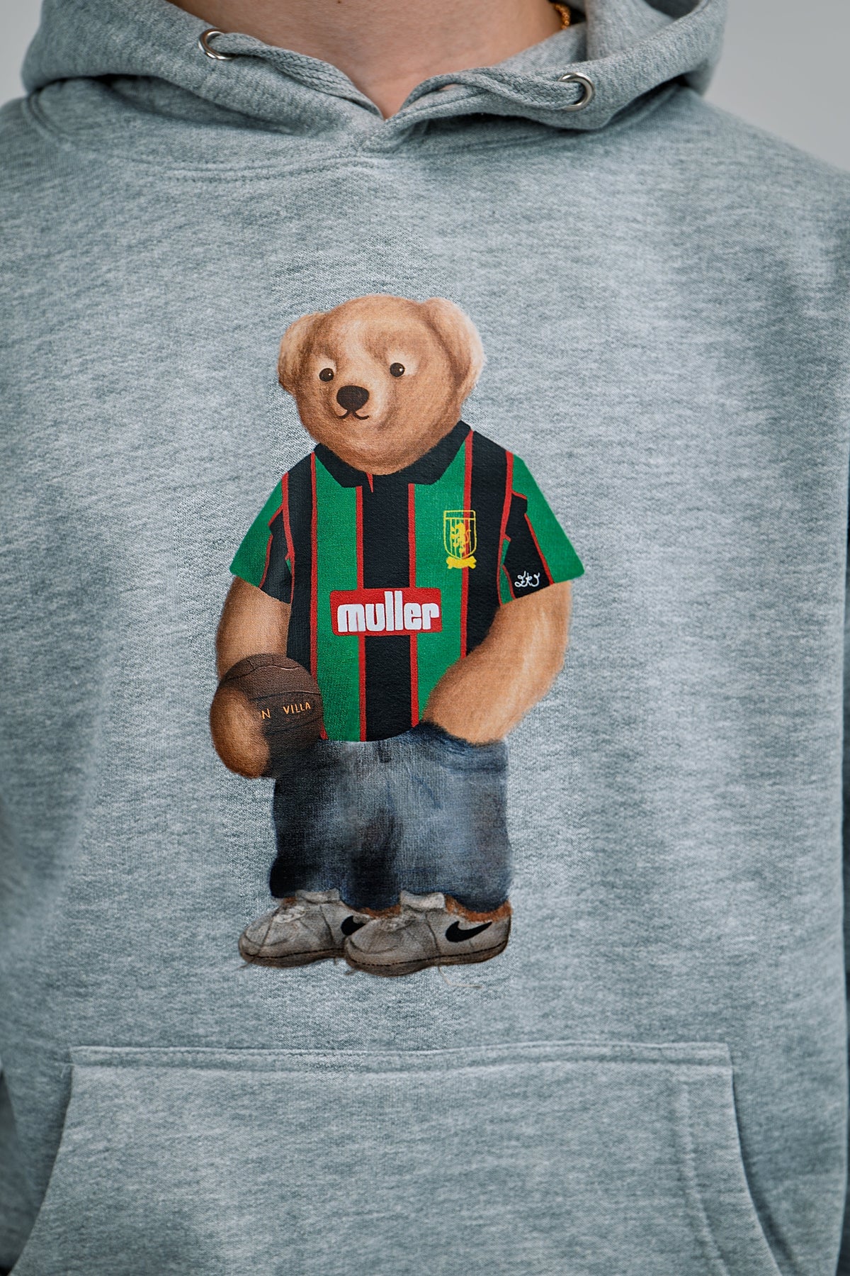 Gray hoodie with a bear wearing Aston Villa 