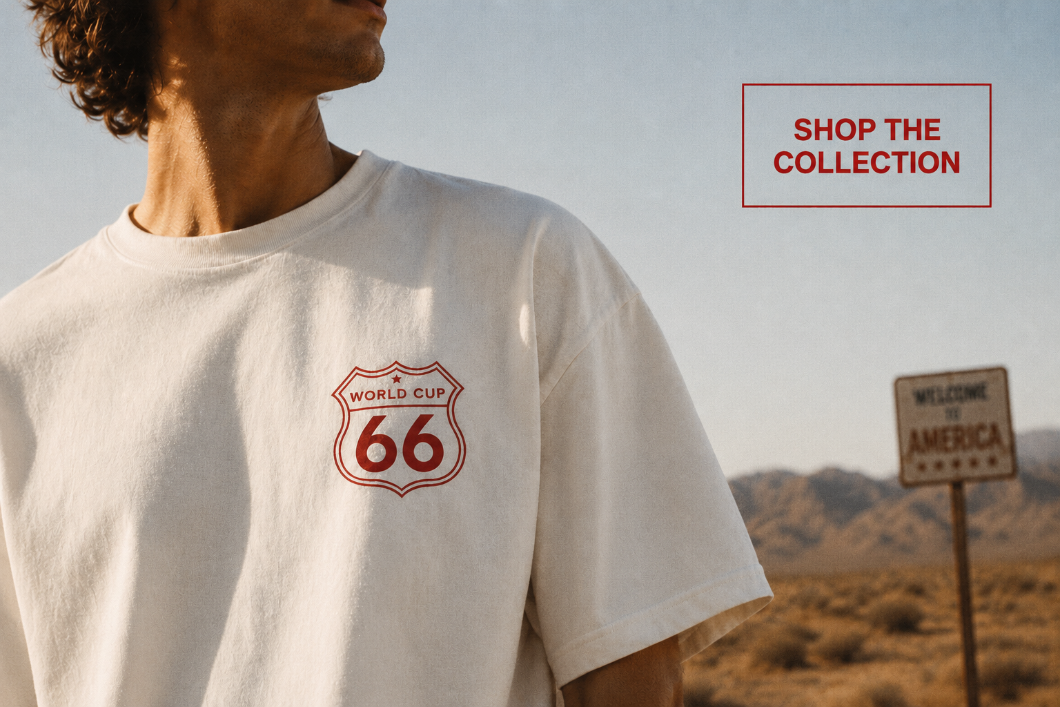 Person wearing a white t-shirt with a red logo in a desert setting, with 'Shop the Collection' text.